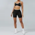 Professional black and white contrast yoga set for women with sports bra and fitness shorts. - XS / Top And Bottom / Black