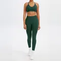 Professional seamless dark green yoga set including high-waisted leggings and sports bra - XS / Top And Bottom / Sports Bra + Leggings / Forest Green