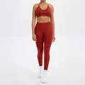 Two-piece red seamless yoga set featuring a sports bra and high-waisted leggings - XS / Top And Bottom / Sports Bra + Leggings / Autumn Red