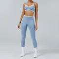 Two-piece light blue color-block yoga set with sports bra and high-waisted leggings - XS / Top And Bottom / Baby Blue