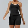 Women's black yoga fitness set with white contrast trim tank top and tight shorts - XS / Top And Bottom / Black