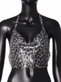 Close-up of metal sequin halter top with sparkling silver and black leopard print mesh - S / Tops / Leopard Silver