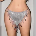 Detail of a sexy silver sequin waist chain with star tassels for beach or party wear. - S / Bottoms / Silver