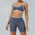 Two-piece yoga set featuring grey-blue sports bra and high-waist shorts with white trim - XS / Top And Bottom / Ice Gray