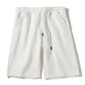Comfortable white men's athletic shorts with drawstring waist and pockets for summer wear - M / Bottoms / White