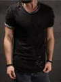 Detail view of men's short sleeve ripped T-shirt with distressed knit fabric texture. - Black