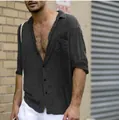 Detailed macro shot of a men's charcoal cotton linen shirt featuring a functional chest pocket - Black