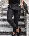 Stylish mens slim fit dark grey plaid casual trousers paired with loafers on stone stairs - S / Bottoms / Black