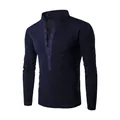 Detail of navy blue slim-fit long-sleeve T-shirt with stand collar and button placket. - M / Tops / Navy Blue