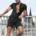 Men's casual black short-sleeve romper jumpsuit lifestyle view on a city rooftop. - 3XL / Top And Bottom / Black