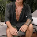 Close-up of a men's dark charcoal cotton linen long-sleeved shirt for a casual summer look - S / Tops / Black