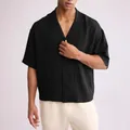 Stylish men's loose black short-sleeved textured lapel shirt for a relaxed summer look. - M / Tops / Black