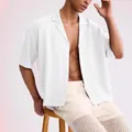 Men's textured white short-sleeved lapel shirt in a relaxed fit for a casual summer look. - M / Tops / White