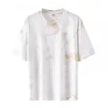 T-shirt in cotone a maniche corte con motivo tie-dye beige su finitura bianca e morbida - Marrone