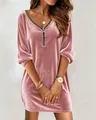 Detailed shot of the pink gold velvet dress featuring a V-neck and front zipper design. - S / Tops / Pink