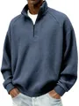 Gros plan du sweat à col zippé en maille gaufrée bleue montrant les détails du tissu. - S / Hauts / Bleu marine