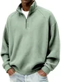 Détail d'un sweat-shirt vert sauge avec fermeture éclair et texture gaufrée - S / Hauts / Vert