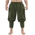 Dettaglio dei pantaloni medievali vichinghi in cotone e lino verde oliva con lacci alle caviglie - Verde militare