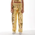 Shiny gold metallic trousers for party wear featuring a loose wide-leg fit and elastic waist - S / Bottoms / Gold