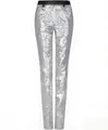 Close-up detail of shimmering silver sequined fabric on men's slim-fit performance pants - M / Silver