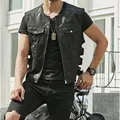 Detailed view of stylish men's black leather biker vest with side straps and pockets - S / Tops / Black