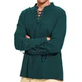 Vue détaillée d'une chemise en coton et lin bleu sarcelle avec laçage au col et aux poignets. - S / Hauts / Vert Foncé