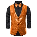Close-up detail of a bright orange sequined stage vest with a matching bow tie for men - Orange