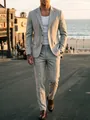 Detail view of light grey plaid slim fit men's suit set in outdoor street setting - S / Top And Bottom / Light Gray