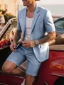 Mannequin portant un ensemble blazer écossais bleu et short près d'une voiture - S / Haut Et Bas / Bleu Marine