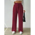 Elegant burgundy ribbed knit wide-leg pants featuring a high elastic waist and drawstring. - Burgundy