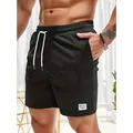 Schwarze Cord-Shorts für Herren mit Kordelzug und minimalistischem Aufnäher - S / Unterteile / Schwarz