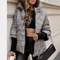 Women's stylish silver quilted hooded jacket with V-pattern stitching and loose fit - S / Tops / Gray