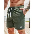 Grüne Herren-Cord-Shorts mit Kordelzug in entspannter Passform - S / Unterteile / Armeegrün