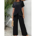 Elegant black two-piece set featuring a wrap hem top and flowing wide-leg pants for summer - S / Top And Bottom / Black