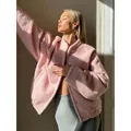 Pink fuzzy winter jacket with stand collar and drop shoulder for a casual chic look - S / Tops / Pink