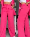 Vue détaillée du pantalon rose vif à taille haute avec profil avant et latéral - Rose rouge