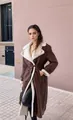 Detailed view of the elegant brown leather coat with white shearling lapel collar. - S / Tops / Coffee