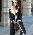 Chic women's black faux leather winter coat with white plush shearling collar and lining - S / Tops / Black