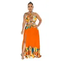 Elegantes orangefarbenes Neckholder-Maxikleid mit Colorblock-Print und Schlitz - S / Oberteile / Orange