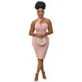 Elegant pink halter neck bodycon dress featuring sleeveless and off-shoulder style - Apricot
