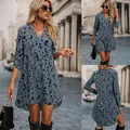 Elegant blue-grey leopard print mini dress featuring long sleeves and a stylish V-neck. - S / Top And Bottom / Blue