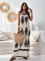 Bohemian white maxi dress with black floral print and backless halter design - S / Tops / Apricot