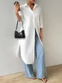 Detail shot of white longline shirt cardigan with side slits for a stylish look - S / Tops / White