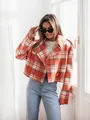 Stylish red plaid cropped wool jacket with wide lapels on a model in natural light - S / Tops / Orange Plaid