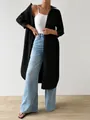 Detailed look at the fit and flow of this elegant black long-line shirt cardigan - S / Tops / Black