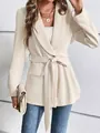 Detail view of a cream slim fit long sleeve blazer with a waist tie belt - S / Tops / Apricot