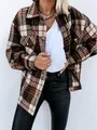 Dettaglio di una giacca a camicia a quadri vintage con maniche lunghe e tasche sul petto - Taglia S / Top / Griglia Marrone