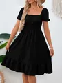 Elegant black smocked waist A-line dress with puff sleeves and ruffled hem detail - S / Black