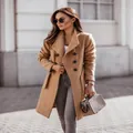 Elegant camel double-breasted wool coat featuring a classic lapel collar and waist belt - S / Tops / Khaki