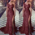 Detail of wine red one-shoulder sequined evening gown with high slit and train. - S / Tops / Burgundy